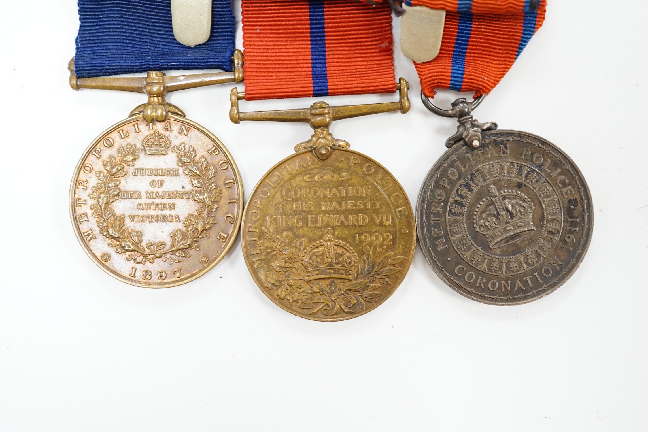 A Metropolitan police medal group awarded to James W. Sidders comprising of three commemorative medals; the 1887 Golden Jubilee medal, the 1902 Edward VII Coronation medal and the 1911 George V Coronation medal, together